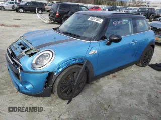 2018 MINI Hardtop Cooper S with VIN WMWXP7C5XJ2A48590, listed as a Copart auction lot 86309584 with 56,643 mi miles and Salvage Title. Bid and sale history available at DreamBid. Image 1.