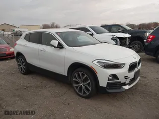2020 BMW X2 sDrive28i with VIN WBXYH9C02L5R10335, listed as a IAAI auction lot 40651317 with 67,897 mi miles. Bid and sale history available at carsss.com. Image 1.