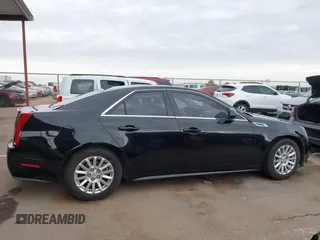 2010 Cadillac CTS with VIN 1G6DA5EGXA0138568, listed as a IAAI auction lot 41354741 with 173,253 mi miles and . Bid and sale history available at DreamBid. Image 13.