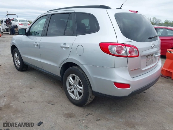 2012 Hyundai Santa Fe GLS with VIN 5XYZG3AB3CG124427, listed as a IAAI auction lot 41953057 with 156,413 mi miles. Bid and sale history available at carsss.com. Image 3.