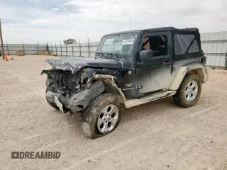 2015 Jeep Wrangler Sahara z VIN 1C4AJWBG4FL615303, wystawiony jako Copart lot #57070465 z przebiegiem Nie podano mil oraz Szkoda całkowita • Salvage title. Historia ofert i sprzedaży dostępna na DreamBid. Obrazek 1.