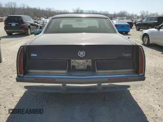 1995 Cadillac Fleetwood z VIN 1G6DW52P6SR702106, wystawiony jako Copart lot #48826215 z przebiegiem 140 971 mil mil oraz Szkoda całkowita • Salvage title. Historia ofert i sprzedaży dostępna na DreamBid. Obrazek 6.