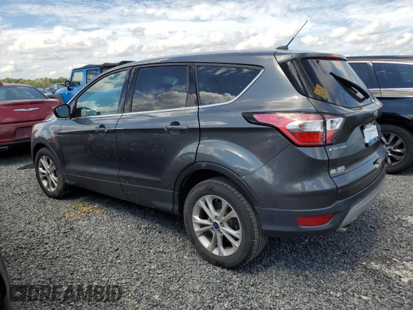 2017 Ford Escape SE z VIN 1FMCU0GDXHUE91333, wystawiony jako Copart lot #82061644 z przebiegiem Nie podano mil oraz Nie do naprawy • Non repairable. Historia ofert i sprzedaży dostępna na DreamBid. Obrazek 2.