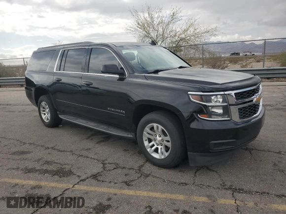 2018 Chevrolet Suburban LS with VIN 1GNSCGKC6JR303482, listed as a Copart auction lot 54703925 with 214,158 mi miles and Salvage title. Bid and sale history available at DreamBid. Image 4.