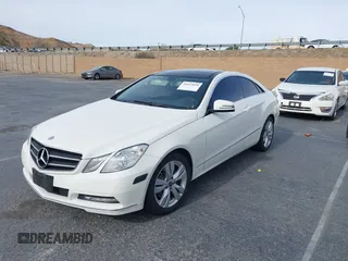 2012 Mercedes-Benz E 350 with VIN WDDKJ5KBXCF133020, listed as a IAAI auction lot 41023858 with 144,330 mi miles and . Bid and sale history available at DreamBid. Image 2.