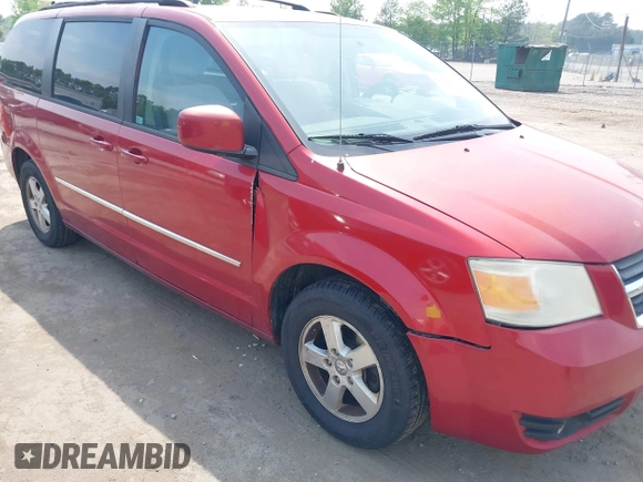 2010 Dodge Grand Caravan SXT with VIN 2D4RN5D17AR145958, listed as a IAAI auction lot 42125450 with 229,790 mi miles and . Bid and sale history available at DreamBid. Image 6.