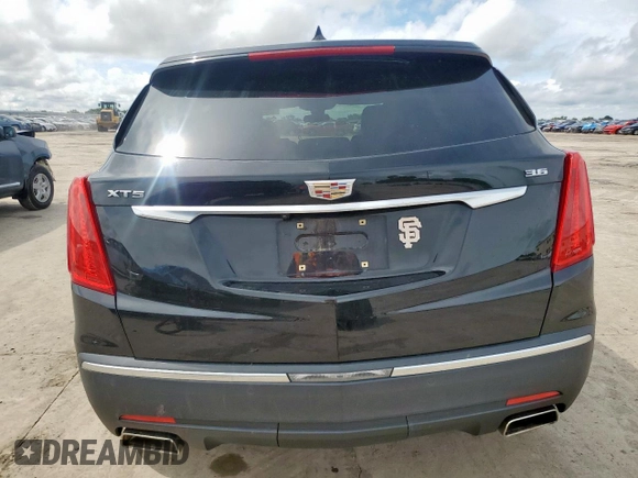 2017 Cadillac XT5 Luxury FWD with VIN 1GYKNBRS3HZ101867, listed as a Copart auction lot 60923215 with 130,209 mi miles and Salvage title. Bid and sale history available at DreamBid. Image 6.