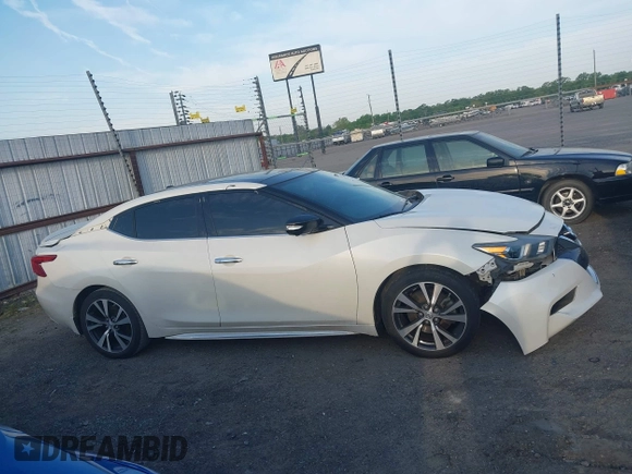 2017 Nissan Maxima S with VIN 1N4AA6AP2HC367322, listed as a IAAI auction lot 42012073 with 116,497 mi miles and . Bid and sale history available at DreamBid. Image 13.