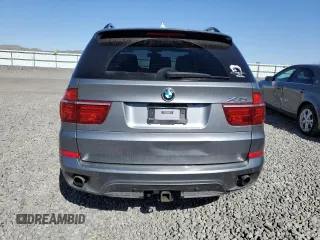 2013 BMW X5 xDrive35i z VIN 5UXZV4C59D0E01402, wystawiony jako Copart lot #55064725 z przebiegiem 108 373 mil mil oraz Szkody całkowita. Historia ofert i sprzedaży dostępna na DreamBid. Obrazek 6.