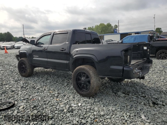 2020 Toyota Tacoma SR5 with VIN 3TMCZ5AN0LM299243, listed as a Copart auction lot 58818825 with 76,449 mi miles and Salvage title. Bid and sale history available at DreamBid. Image 2.