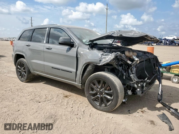 2022 Jeep Grand Cherokee Laredo X with VIN 1C4RJFAGXNC146723, listed as a Copart auction lot 58119455 with 55,759 mi miles and Salvage title. Bid and sale history available at DreamBid. Image 4.