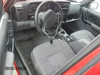 1998 Jeep Cherokee Sport with VIN 1J4FJ68S7WL275947, listed as a Copart auction lot 74333874 with 0 mi miles and Salvage Title. Bid and sale history available at carsss.com. Image 8.