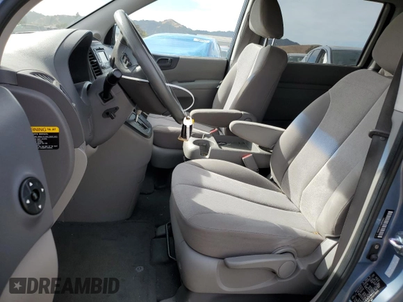 2012 Kia Sedona LX with VIN KNDMG4C7XC6418645, listed as a Copart auction lot 79535074 with 130,023 mi miles and Salvage Title. Bid and sale history available at DreamBid. Image 7.