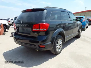 2015 Dodge Journey SXT with VIN 3C4PDCBG2FT718451, listed as a IAAI auction lot 42039821 with 198,695 mi miles and . Bid and sale history available at DreamBid. Image 4.