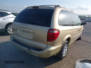 2001 Dodge Caravan Sport with VIN 2B8GP44381R223296, listed as a IAAI auction lot 42139126 with 129,260 mi miles and . Bid and sale history available at carsss.com. Image 4.
