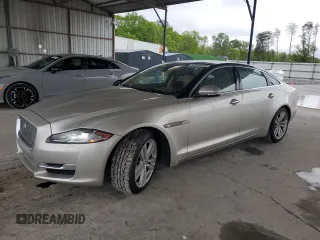 2016 Jaguar XJ Portfolio with VIN SAJWA2G70G8V93006, listed as a Copart auction lot 52324635 with 123,690 mi miles and Salvage Title. Bid and sale history available at DreamBid. Image 1.
