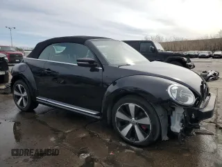 2013 Volkswagen Beetle with VIN 3VW7S7AT3DM819093, listed as a Copart auction lot 49997645 with 43,233 mi miles and Salvage Title. Bid and sale history available at DreamBid. Image 4.
