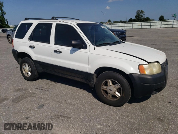 2004 Ford Escape XLS with VIN 1FMYU021X4DA07352, listed as a Copart auction lot 68909864 with 275,776 mi miles and Salvage Title. Bid and sale history available at DreamBid. Image 4.