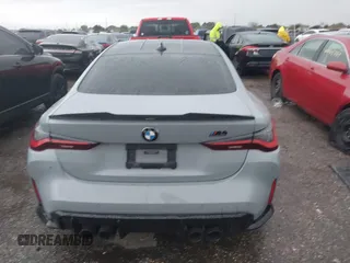 2021 BMW M4 Competition with VIN WBS33AZ03MCG59977, listed as a IAAI auction lot 41012387 with 50,572 mi miles. Bid and sale history available at carsss.com. Image 15.