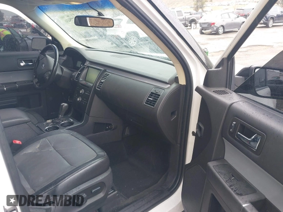 2015 Ford Flex SEL z VIN 2FMGK5C89FBA02548, wystawiony jako IAAI lot #41775436 z przebiegiem 132 856 mil mil oraz . Historia ofert i sprzedaży dostępna na DreamBid. Obrazek 5.