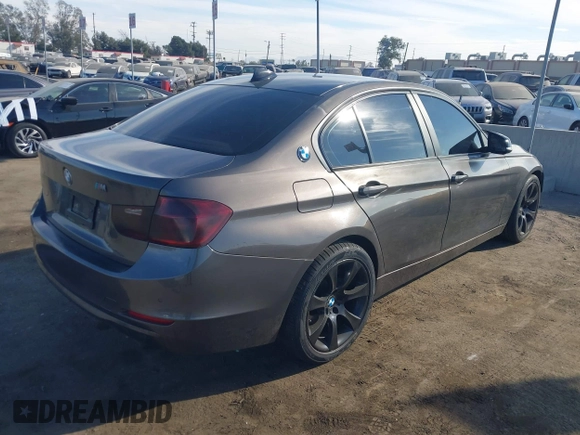 2014 BMW 3 Series 328i with VIN WBA3A5C56EP603819, listed as a IAAI auction lot 41217764 with 156,140 mi miles and . Bid and sale history available at carsss.com. Image 4.
