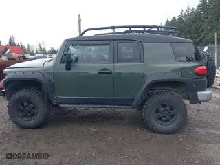 2011 Toyota FJ Cruiser with VIN JTEBU4BF5BK108168, listed as a IAAI auction lot 41829688 with 163,354 mi miles. Bid and sale history available at carsss.com. Image 15.