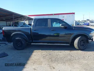 2017 Ram 1500 Rebel z VIN 1C6RR7YT5HS811773, wystawiony jako IAAI lot #41410030 z przebiegiem 96 418 mil mil oraz . Historia ofert i sprzedaży dostępna na DreamBid. Obrazek 14.