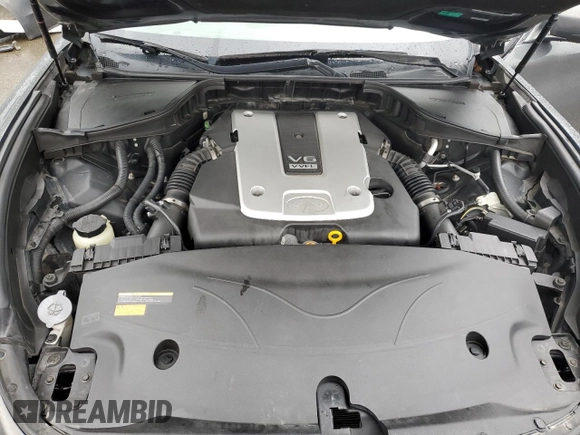 2012 Infiniti M z VIN JN1BY1AP8CM334084, wystawiony jako Copart lot #50758815 z przebiegiem 107 917 mil mil oraz Szkoda całkowita • Salvage title. Historia ofert i sprzedaży dostępna na DreamBid. Obrazek 11.