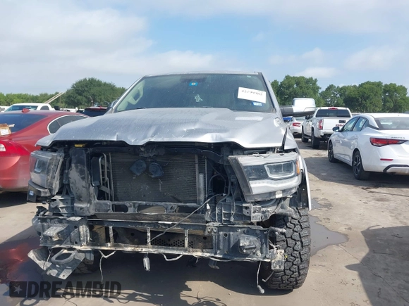 2019 Ram 1500 Laramie with VIN 1C6SRFJT8KN686506, listed as a IAAI auction lot 42499382 with 145,287 mi miles and . Bid and sale history available at DreamBid. Image 13.