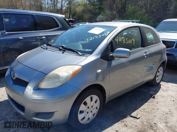 2009 Toyota Yaris with VIN JTDJT903495263456, listed as a IAAI auction lot 42135019 with 219,704 mi miles. Bid and sale history available at carsss.com. Image 2.