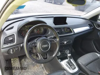 2015 Audi Q3 Premium Plus z VIN WA1EFCFS8FR001278, wystawiony jako IAAI lot #42475043 z przebiegiem 125 417 mil mil oraz . Historia ofert i sprzedaży dostępna na DreamBid. Obrazek 19.