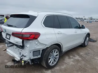 2023 BMW X5 xDrive45e with VIN 5UXTA6C02P9R94549, listed as a IAAI auction lot 41534725 with 8,698 mi miles. Bid and sale history available at carsss.com. Image 4.