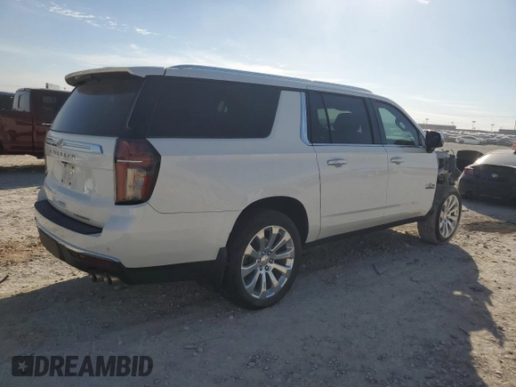 2023 Chevrolet Suburban Premier with VIN 1GNSCFKD2PR106790, listed as a Copart auction lot 46873635 with 31,972 mi miles and Salvage title. Bid and sale history available at DreamBid. Image 3.