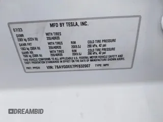 2023 Tesla Model Y Long Range with VIN 7SAYGDEE7PF832007, listed as a IAAI auction lot 41751598 with 14,126 mi miles and . Bid and sale history available at DreamBid. Image 9.