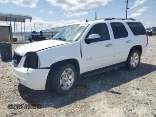 2011 GMC Yukon SLT z VIN 1GKS1CE08BR150361, wystawiony jako Copart lot #52802775 z przebiegiem 238 615 mil mil oraz Szkoda całkowita • Salvage title. Historia ofert i sprzedaży dostępna na DreamBid. Obrazek 1.