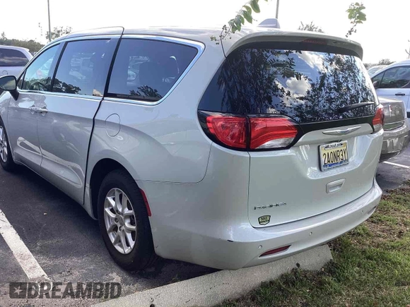 2017 Chrysler Pacifica Touring with VIN 2C4RC1DG5HR764942, listed as a IAAI auction lot 42255421 with 64,381 mi miles and . Bid and sale history available at DreamBid. Image 5.