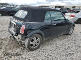 2005 MINI Convertible with VIN WMWRF33485TG11549, listed as a Copart auction lot 87285984 with 58,934 mi miles and Salvage title. Bid and sale history available at DreamBid. Image 3.