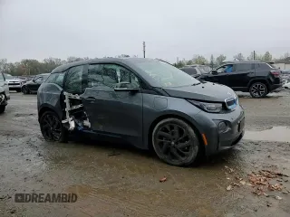 2017 BMW i3 z VIN WBY1Z8C38HV890419, wystawiony jako Copart lot #52199865 z przebiegiem Nie podano mil oraz Szkody całkowita. Historia ofert i sprzedaży dostępna na DreamBid. Obrazek 10.