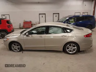 2018 Ford Fusion SE z VIN 3FA6P0HD2JR201693, wystawiony jako IAAI lot #42012709 z przebiegiem 110 857 mil mil oraz . Historia ofert i sprzedaży dostępna na DreamBid. Obrazek 14.
