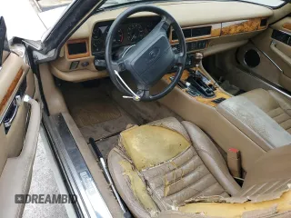 1994 Jaguar XJS with VIN SAJNX2749RC191243, listed as a Copart auction lot 76037994 with 74,842 mi miles and Salvage Title. Bid and sale history available at carsss.com. Image 8.