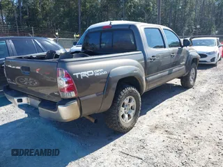 2014 Toyota Tacoma with VIN 5TFLU4EN4EX107161, listed as a IAAI auction lot 41411872 with 134,273 mi miles. Bid and sale history available at carsss.com. Image 4.