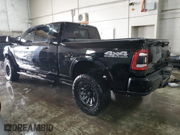 2021 Ram 2500 Laramie with VIN 3C6UR5NL8MG502996, listed as a Copart auction lot 87127824 with 63,840 mi miles and Salvage Title. Bid and sale history available at carsss.com. Image 2.