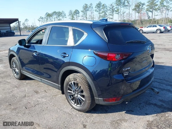 2019 Mazda CX-5 Touring with VIN JM3KFACM5K1608354, listed as a IAAI auction lot 41675828 with NaN miles. Bid and sale history available at carsss.com. Image 3.