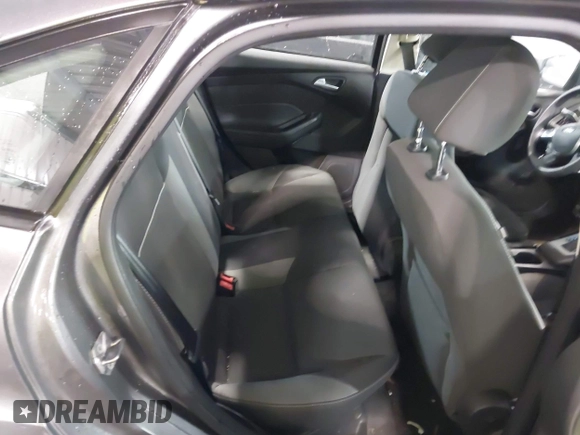 2012 Ford Focus SE with VIN 1FAHP3F21CL408430, listed as a IAAI auction lot 42286632 with 140,387 mi miles and . Bid and sale history available at DreamBid. Image 8.