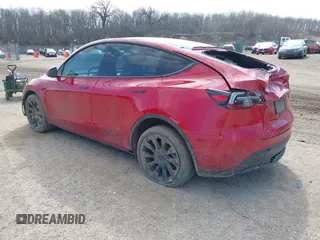 2023 Tesla Model Y Long Range with VIN 7SAYGDEE6PA157652, listed as a IAAI auction lot 41866777 with 22,584 mi miles. Bid and sale history available at carsss.com. Image 3.