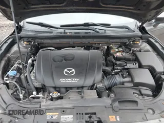 2014 Mazda 3 S Grand Touring with VIN JM1BM1W39E1145186, listed as a IAAI auction lot 41948404 with 111,702 mi miles and . Bid and sale history available at DreamBid. Image 10.