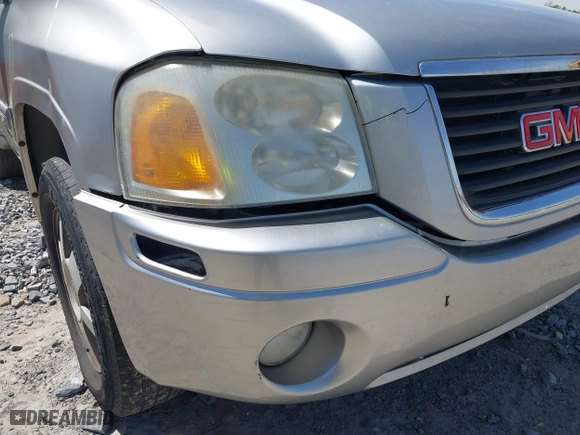 2005 GMC Envoy SLE with VIN 1GKDS13S652390259, listed as a IAAI auction lot 41825258 with 162,172 mi miles. Bid and sale history available at carsss.com. Image 6.