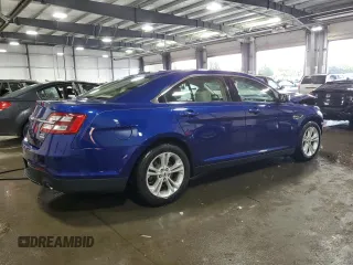 2015 Ford Taurus SEL with VIN 1FAHP2E94FG149695, listed as a Copart auction lot 65609184 with 126,803 mi miles and Salvage Title. Bid and sale history available at DreamBid. Image 3.