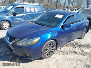2018 Nissan Altima 2.5 SL with VIN 1N4AL3AP1JC294068, listed as a IAAI auction lot 41639471 with 100,772 mi miles. Bid and sale history available at carsss.com. Image 18.