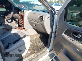2006 GMC Envoy XL Denali with VIN 1GKES66M566159202, listed as a IAAI auction lot 41988276 with 293,983 mi miles. Bid and sale history available at carsss.com. Image 5.